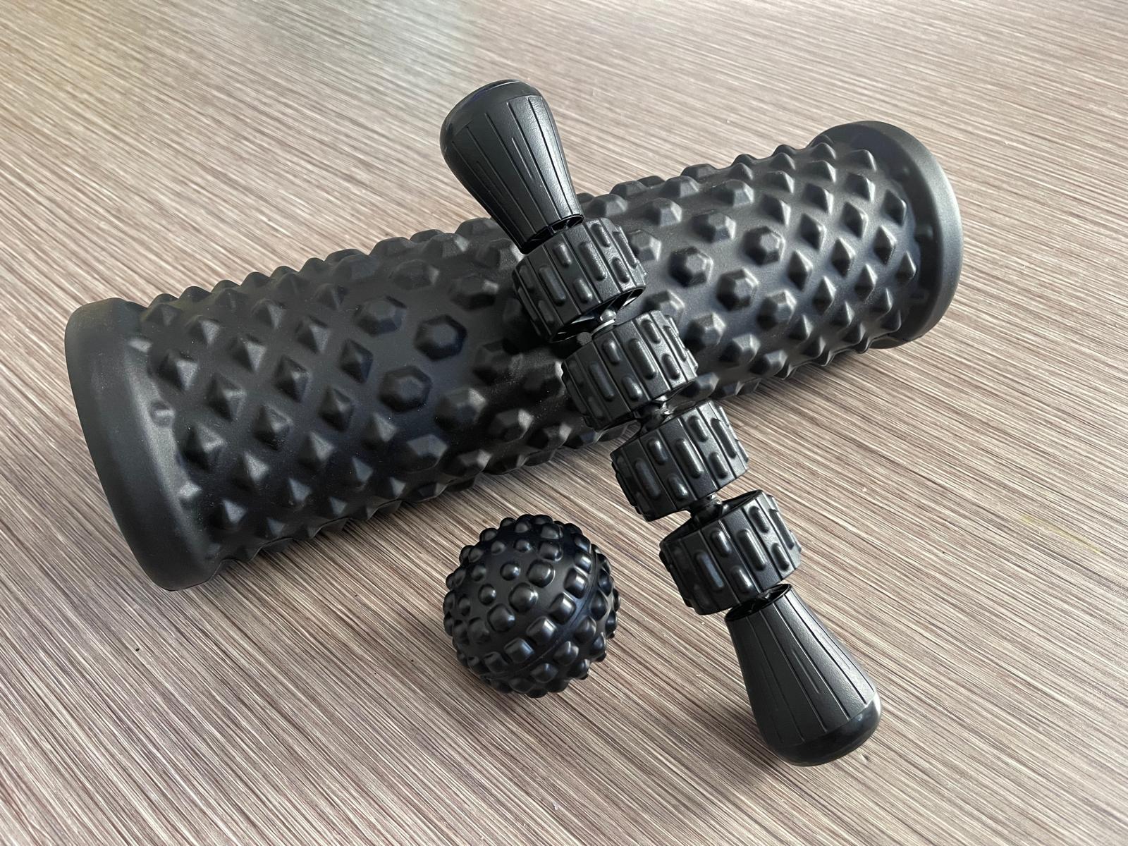 Photo of a hand-held foam roller, a large cylindrical foam roller, and a textured foam massage ball—tools designed for deep tissue release.