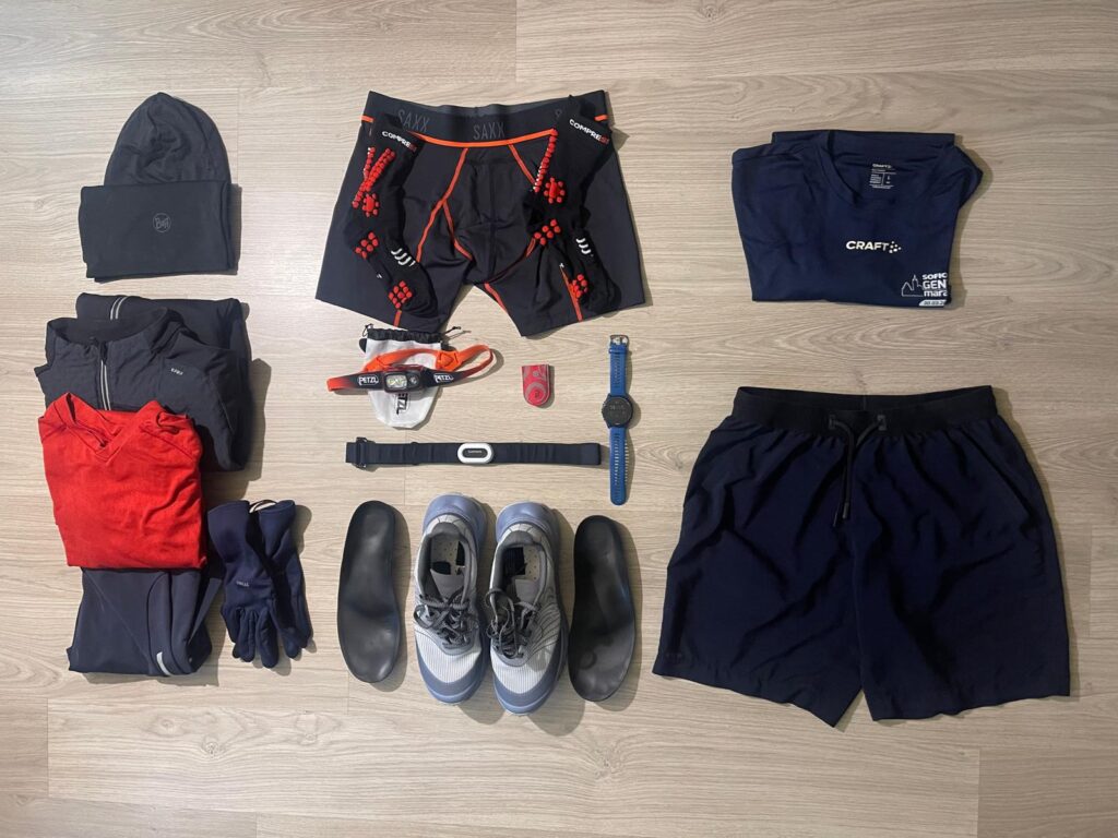 Flat lay photo of running essentials for all seasons, including shoes, insoles, watch, and seasonal clothing.