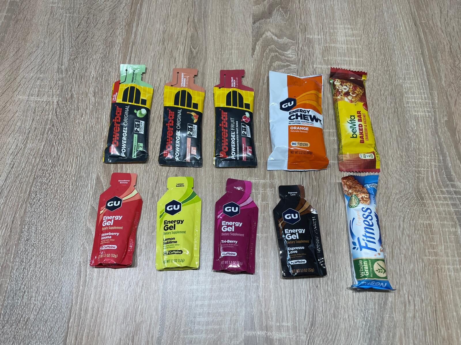 Energy gels from PowerGel and GU with BelVita and Fitness cereal bars used as running fuel during long runs or races.